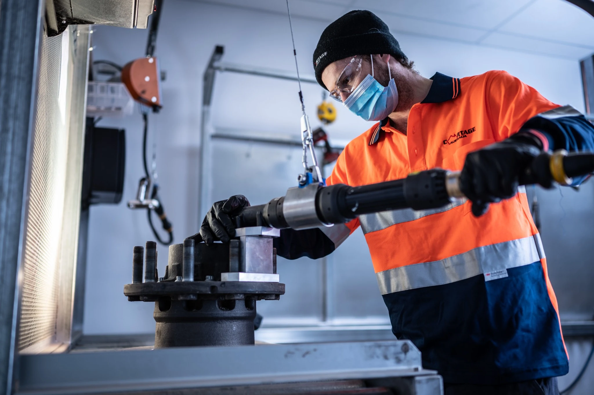 Technician completing mechanical work